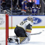 
              Vegas Golden Knights goaltender Logan Thompson reacts after giving up a goal to New York Islanders center Mathew Barzal, not seen, in overtime an NHL hockey game Saturday, Jan. 28, 2023, in Elmont, N.Y. The Islanders won 2-1 in overtime. (AP Photo/Adam Hunger)
            