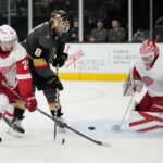 
              Detroit Red Wings goaltender Ville Husso (35) blocks a shot by Vegas Golden Knights right wing Phil Kessel (8) during the second period of an NHL hockey game Thursday, Jan. 19, 2023, in Las Vegas. (AP Photo/John Locher)
            
