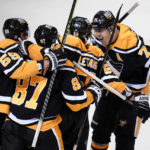 
              Pittsburgh Penguins' Kris Letang (58) celebrates his game-winning, overtime goal during an NHL hockey game against the Florida Panthers in Pittsburgh, Tuesday, Jan. 24, 2023. The Penguins won 7-6 in overtime. (AP Photo/Gene J. Puskar)
            