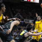 
              Maryland guard Jahmir Young (1) shoots over Purdue guard Ethan Morton (25) during the first half of an NCAA college basketball game in West Lafayette, Ind., Sunday, Jan. 22, 2023. (AP Photo/Michael Conroy)
            