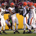 
              Cleveland Browns safety Grant Delpit (22) celebrates an interception with teammates during the second half of an NFL football game against the Washington Commanders, Sunday, Jan. 1, 2023, in Landover, Md. (AP Photo/Susan Walsh)
            