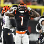 
              Cincinnati Bengals wide receiver Ja'Marr Chase celebrates a first down in the first half of an NFL wild-card playoff football game against the Baltimore Ravens in Cincinnati, Sunday, Jan. 15, 2023. (AP Photo/Darron Cummings)
            