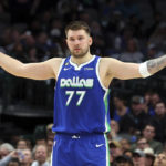 
              Dallas Mavericks guard Luka Doncic gestures on the court in the second half of an NBA basketball game against the Detroit Pistons, Monday, Jan. 30, 2023, in Dallas. (AP Photo/Richard W. Rodriguez)
            