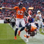 
              Denver Broncos running back Tyler Badie (36) dives for a touchdown against the Los Angeles Chargers during the second half of an NFL football game in Denver, Sunday, Jan. 8, 2023. (AP Photo/Jack Dempsey)
            