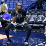 
              Brooklyn Nets forward Kevin Durant warms up before an NBA basketball game against the New Orleans Pelicans in New Orleans, Friday, Jan. 6, 2023. (AP Photo/Matthew Hinton)
            