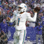 
              Miami Dolphins quarterback Tua Tagovailoa (1) sets up to pass during fourth quarter of an NFL football game against the Buffalo Bills at Highmark Stadium on Saturday, Dec. 17, 2022 in Orchard Park, N.Y. (David Santiago/Miami Herald via AP)
            