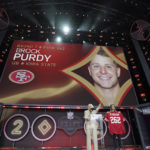 
              FILE - Iowa State quarterback Brock Purdy gets picked as Mr. Irrelevant by the San Francisco 49ers as the 262nd and last pick of the 2022 NFL Draft on Saturday, April 30, 2022, in Las Vegas. With one more win for the 49ers, Purdy will be the first rookie QB to start in a Super Bowl. (AP Photo/Doug Benc, File)
            