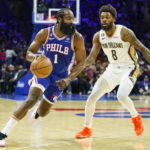 
              Philadelphia 76ers' James Harden, left, drives to the basket against New Orleans Pelicans' Naji Marshall, right, during the first half of an NBA basketball game, Monday, Jan. 2, 2023, in Philadelphia. (AP Photo/Chris Szagola)
            