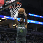 
              Minnesota Timberwolves guard Jaylen Nowell (4) goes up for a dunk during the first half of an NBA basketball game against the Houston Rockets, Saturday, Jan. 21, 2023, in Minneapolis. (AP Photo/Abbie Parr)
            