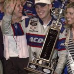 
              FILE - Kevin Harvick celebrates in victory lane after winning the NASCAR Food City 250 in Bristol, Tenn., Friday, Aug. 25, 2000. Kevin Harvick said Thursday, Jan. 12, 2023, he will retire from NASCAR competition at the end of the 2023 season. (AP Photo/Mark Humphrey, File)
            
