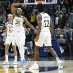 
              Indiana Pacers center Myles Turner (33) reacts during the second half of an NBA basketball game against the Charlotte Hornets, Sunday, Jan. 8, 2023, in Indianapolis. (AP Photo/Marc Lebryk)
            