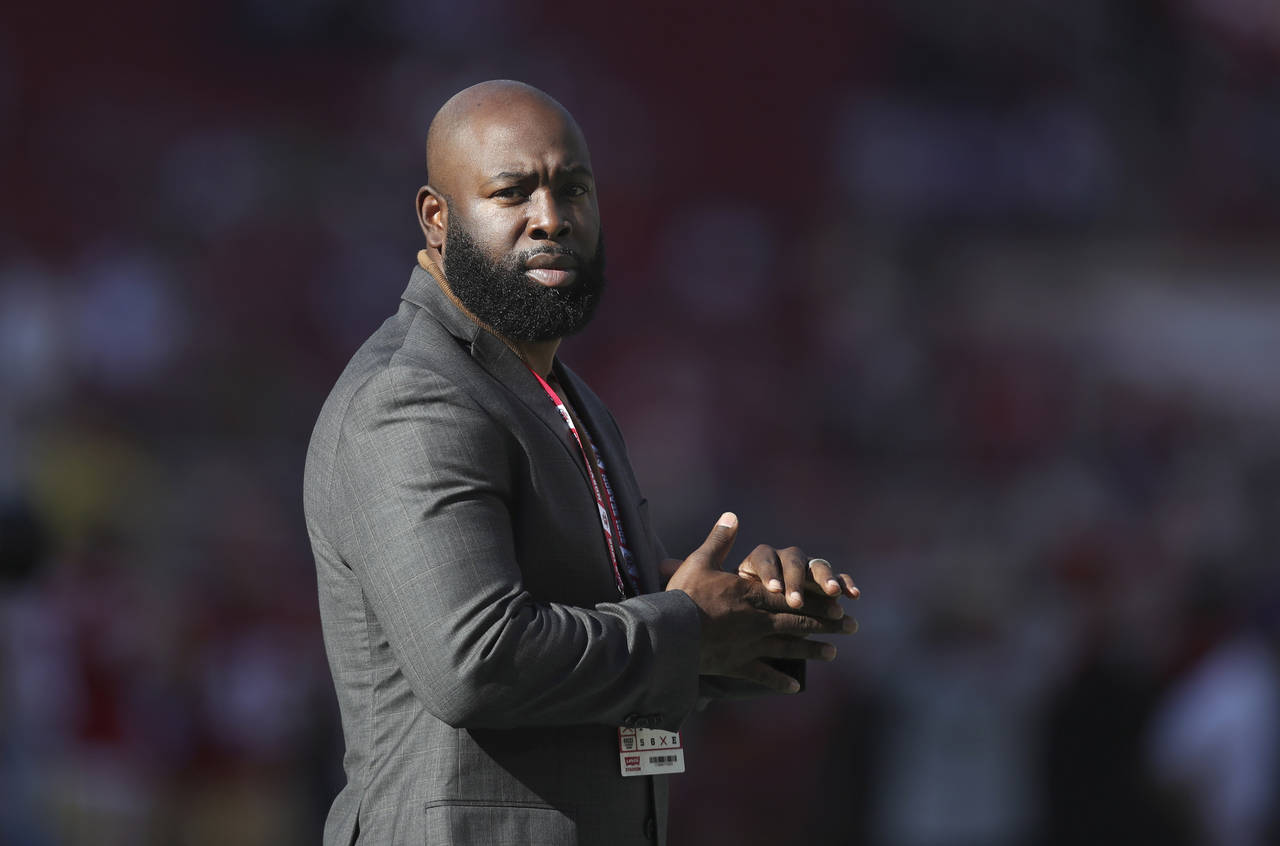 FILE - San Francisco 49ers Director of Player Personnel Ran Carthon waits for the team's NFL footba...