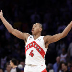 
              Toronto Raptors forward Scottie Barnes reacts after making a basket against the New York Knicks during the second half of an NBA basketball game Monday, Jan. 16, 2023, in New York. (AP Photo/Adam Hunger)
            
