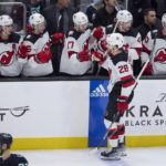 
              New Jersey Devils defenseman Damon Severson (28) is congratulated after scoring against the Seattle Kraken during the second period of an NHL hockey game, Thursday, Jan. 19, 2023, in Seattle. (AP Photo/John Froschauer)
            