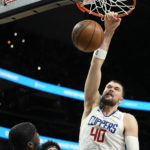 
              Los Angeles Clippers center Ivica Zubac (40) scores during the first half of an NBA basketball game against the Atlanta Hawks, Saturday, Jan. 28, 2023, in Atlanta. (AP Photo/John Bazemore)
            