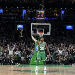 
              Boston Celtics guard Marcus Smart (36) celebrates after the team scored in overtime in an NBA basketball game against the Golden State Warriors, Thursday, Jan. 19, 2023, in Boston. (AP Photo/Steven Senne)
            
