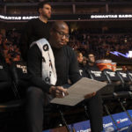 
              Sacramento Kings coach Mike Brown looks over his notes before the team's NBA basketball game against the Houston Rockets in Sacramento, Calif., Wednesday, Jan. 11, 2023. (AP Photo/José Luis Villegas)
            