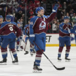 
              Colorado Avalanche right wing Mikko Rantanen, center, gestures after the third period of an NHL hockey game against the Detroit Red Wings, Monday, Jan. 16, 2023, in Denver. (AP Photo/David Zalubowski)
            