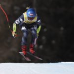 
              United States' Mikaela Shiffrin speeds down the course during an alpine ski, women's World Cup super-G, in Cortina d'Ampezzo, Italy, Sunday, Jan. 22, 2023. (AP Photo/Gabriele Facciotti)
            