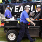 
              Philadelphia Eagles defensive end Josh Sweat is carted off the field after being injured in the first half of an NFL football game against the New Orleans Saints in Philadelphia, Sunday, Jan. 1, 2023. (AP Photo/Matt Rourke)
            