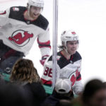 
              New Jersey Devils' Jack Hughes (86) and Dougie Hamilton (7) celebrate a goal scored by Hughes in overtime of an NHL hockey game against the Dallas Stars, Friday, Jan. 27, 2023, in Dallas. The Devils won 3-2. (AP Photo/Tony Gutierrez)
            
