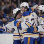 
              Buffalo Sabres' Owen Power (25) is congratulated by teammates after scoring during the first period of an NHL hockey game against the St. Louis Blues Tuesday, Jan. 24, 2023, in St. Louis. (AP Photo/Jeff Roberson)
            