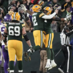 
              Green Bay Packers quarterback Aaron Rodgers (12) celebrates with teammate Elgton Jenkins after throwing a touchdown pass during the first half of an NFL football game against the Minnesota Vikings, Sunday, Jan. 1, 2023, in Green Bay, Wis. (AP Photo/Morry Gash)
            