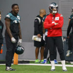 
              Philadelphia Eagles quarterback Jalen Hurts, right, and wide receiver A.J. Brown (11), left, watches as they wait for their next drill during an NFL football workout, Thursday, Jan. 26, 2023, in Philadelphia. The Eagles are scheduled to play the San Francisco 49ers Sunday in the NFC championship game.(AP Photo/Chris Szagola)
            