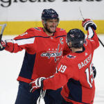 
              FILE - Washington Capitals left wing Alex Ovechkin (8), of Russia, celebrates his third goal of the night with center Nicklas Backstrom (19), of Sweden, during the third period of the team's NHL hockey game against the Los Angeles Kings, Tuesday, Feb. 4, 2020, in Washington. Ovechkin earlier this season became the third player in NHL history to surpass 800 career goals. Only Wayne Gretzky has scored more than Ovechkin's 810. But Ovechkin has not gotten within range of Gretzky's record of 894 goals by himself. Dozens of Washington Capitals teammates have assisted on goals by Ovechkin during his 18-year career since coming to North America. (AP Photo/Nick Wass, File)
            