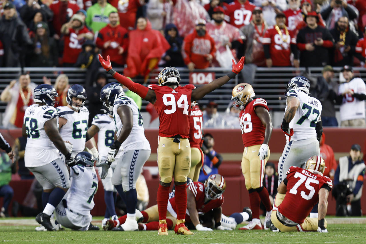 San Francisco 49ers defensive end Charles Omenihu (94) celebrates during the second half of an NFL ...