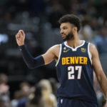 
              Denver Nuggets guard Jamal Murray gestures to the crowd as time runs out in the second half of an NBA basketball game against the New Orleans Pelicans Tuesday, Jan. 31, 2023, in Denver. (AP Photo/David Zalubowski)
            