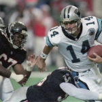
              Carolina Panthers quarterback Frank Reich (14) plays against the Atlanta Falcons in Atlanta, Sept. 3, 1995. The Carolina Panthers announced Thursday, Jan. 26, 2023, they have agreed to terms with Frank Reich to become their new head coach. (Bob Leverone/The Charlotte Observer via AP)
            