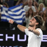 
              Stefanos Tsitsipas of Greece celebrates after defeating Jannik Sinner of Italy during their fourth round match at the Australian Open tennis championship in Melbourne, Australia, Sunday, Jan. 22, 2023. (AP Photo/Ng Han Guan)
            