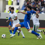 
              Kuwait's Bader Tareq, center, fights for the ball against Iraq's players, during a friendly football match between Kuwait and Iraq at the Sports City Stadium in Basra, Iraq, on Friday, Dec. 30, 2022. Iraq defeated Kuwait by 1-0. (AP Photo/Nabil al-Jurani)
            