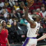 
              Los Angeles Lakers forward LeBron James (6) shoots against the Portland Trail Blazers during the second half of an NBA basketball game in Portland, Ore., Sunday, Jan. 22, 2023. (AP Photo/Craig Mitchelldyer)
            