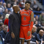 
              St. John's head coach Mike Anderson talks with St. John's AJ Storr (2) in the first half of an NCAA college basketball game against Connecticut, Sunday, Jan. 15, 2023, in Hartford, Conn. (AP Photo/Jessica Hill)
            
