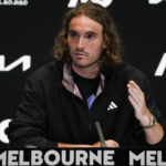 
              Stefanos Tsitsipas of Greece gestures during a press conference ahead of the Australian Open tennis championship in Melbourne, Australia, Saturday, Jan. 14, 2023. (AP Photo/Mark Baker)
            