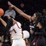 
              Southern California guard Taylor Bigby, left, shoots as Stanford forward Francesca Belibi defends during the first half of an NCAA college basketball game Sunday, Jan. 15, 2023, in Los Angeles. (AP Photo/Mark J. Terrill)
            