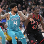 
              Toronto Raptors forward Pascal Siakam (43) is defended by Charlotte Hornets center Nick Richards (4) during the first half of an NBA basketball game Thursday, Jan. 12, 2023, in Toronto. (Frank Gunn/The Canadian Press via AP)
            