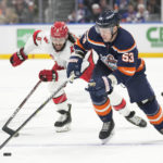 
              New York Islanders center Casey Cizikas (53) skates against Carolina Hurricanes defenseman Jalen Chatfield (5) during the second period of an NHL hockey game, Saturday, Jan. 21, 2023, in Elmont, N.Y. (AP Photo/Mary Altaffer)
            