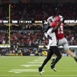
              Georgia tight end Brock Bowers (19) makes a touchdown catch against TCU safety Abraham Camara (14) during the second half of the national championship NCAA College Football Playoff game, Monday, Jan. 9, 2023, in Inglewood, Calif. (AP Photo/Marcio Jose Sanchez)
            
