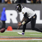 
              Baltimore Ravens quarterback Tyler Huntley chases a fumbled snap in the first half of an NFL wild-card playoff football game against the Cincinnati Bengals in Cincinnati, Sunday, Jan. 15, 2023. (AP Photo/Jeff Dean)
            