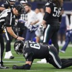 
              Philadelphia Eagles' Lane Johnson is hurt during the second half of an NFL football game against the Dallas Cowboys Saturday, Dec. 24, 2022, in Arlington, Texas. (AP Photo/Tony Gutierrez)
            