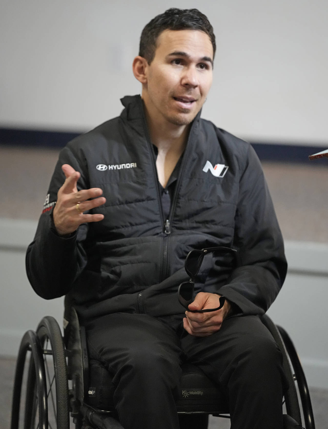 Robert Wickens answers questions during an interview prior to the Rolex 24 hour auto race at Dayton...