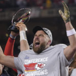 
              Kansas City Chiefs tight end Travis Kelce celebrates after the NFL AFC Championship playoff football game against the Cincinnati Bengals, Sunday, Jan. 29, 2023, in Kansas City, Mo. The Chiefs won 23-20. (AP Photo/Ed Zurga)
            