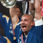 
              FILE - Juventus' Gianluca Vialli raises aloft the Champions Cup at the end of the final against Ajax of Amsterdam at Rome's Olympic stadium, Wednesday, May 22, 1996. Gianluca Vialli, the former Italy striker who helped both Sampdoria and Juventus win Serie A and European trophies before becoming a player-manager at Chelsea, has died on Friday, Jan. 6, 2023. He was 58. (AP Photo/Dusan Vranic, File)
            