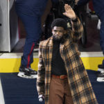 
              Former Montreal Canadiens P.K. Subban salutes the crowd as he is introduced during a ceremony before an NHL hockey game against the Nashville Predators in Montreal, Thursday, Jan. 12, 2023. (Paul Chiasson/The Canadian Press via AP)
            