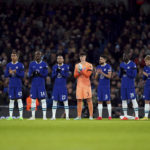 
              Chelsea players observe a minutes applause in tribute to Gianluca Vialli before the  FA Cup third round soccer match between Manchester City and Chelsea, at the Etihad Stadium, Manchester, Sunday, Jan. 8, 2023. (Martin Rickett/PA via AP)
            
