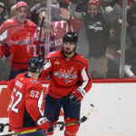 
              Washington Capitals left wing Marcus Johansson (90) celebrates his goal against the Pittsburgh Penguins with defenseman Matt Irwin (52) during the third period of an NHL hockey game Thursday, Jan. 26, 2023, in Washington. The Capitals won 3-2 in a shootout. (AP Photo/Nick Wass)
            