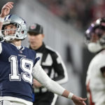 
              Dallas Cowboys place kicker Brett Maher (19) watches his extra point miss against the Tampa Bay Buccaneers during the second half of an NFL wild-card football game, Monday, Jan. 16, 2023, in Tampa, Fla. (AP Photo/Chris Carlson)
            